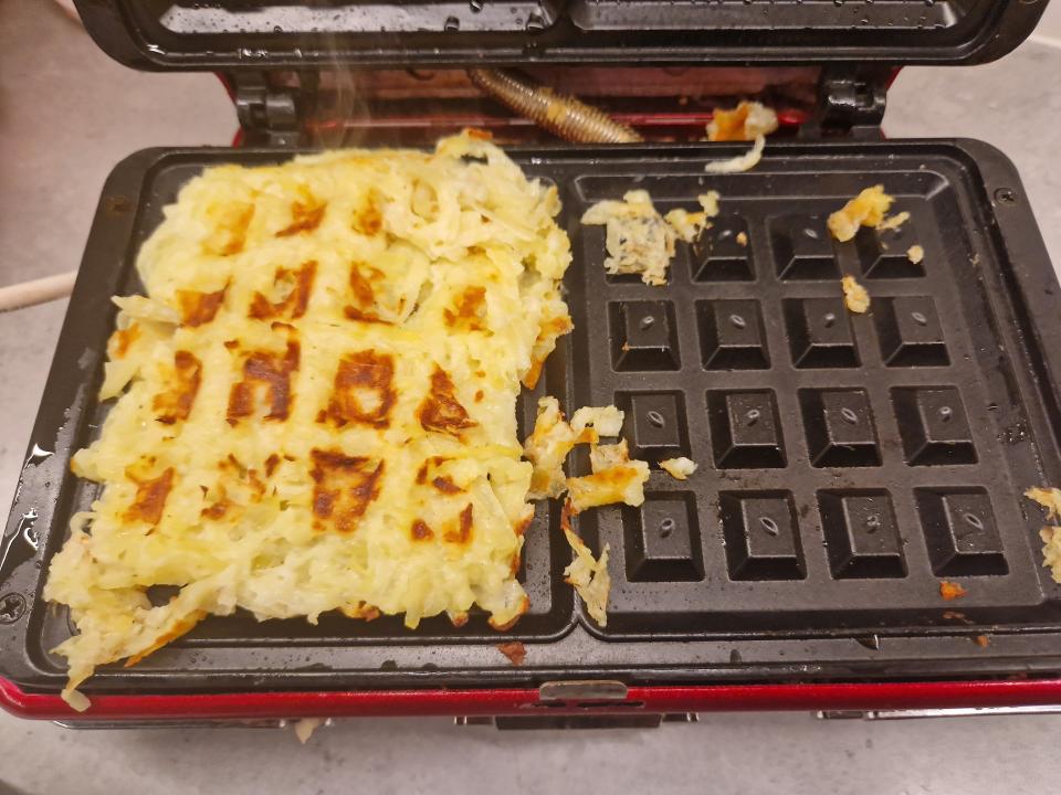 hash brown stuck in a square waffle iron