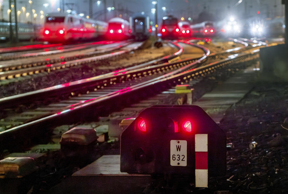 Trains are parked outside the central train station in Frankfurt, Germany, Friday, Dec. 8, 2023, when train drivers of the GDL union went on a 24-hour-strike. (AP Photo/Michael Probst)