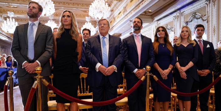 Trump supporters including Eric and Lara Trump, Donald Trump Jr, Kimberley Guilfoyle, Tiffany Trump and Michael Boulos standing behind a velvet rope to listen to Donald Trump's speech at Mar-a-lLago on April 4, 2023.