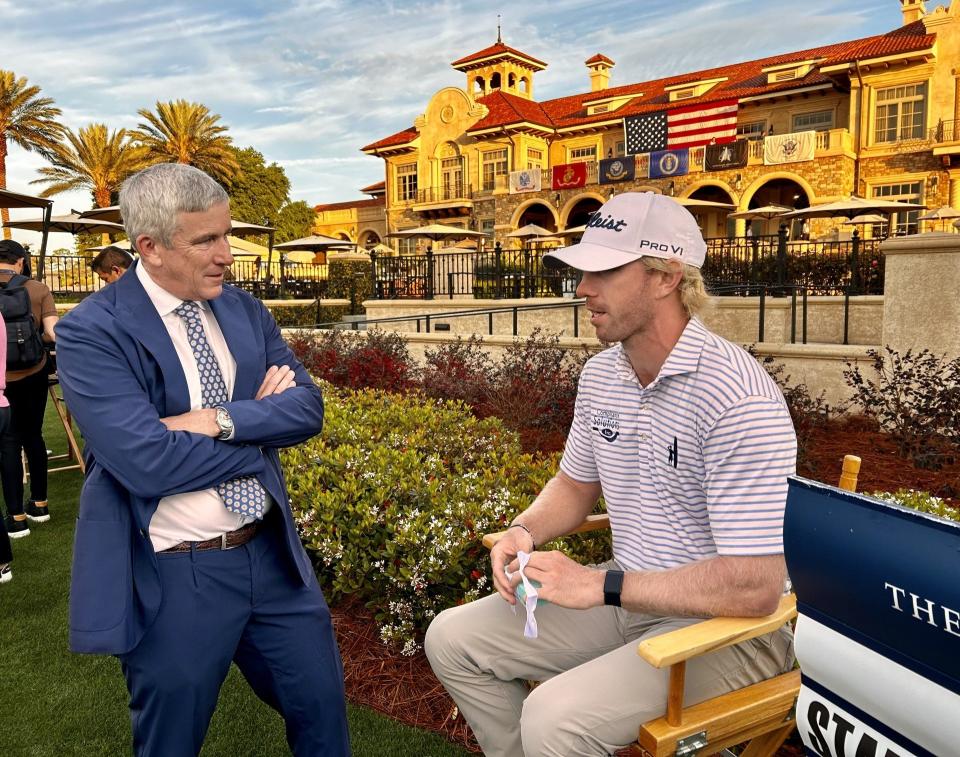 PGA Tour Commissioner Jay Monahan, left, chats with Jimmy Stanger at a media availability Wednesday for first-time Players Championship participants behind the TPC Sawgrass clubhouse.