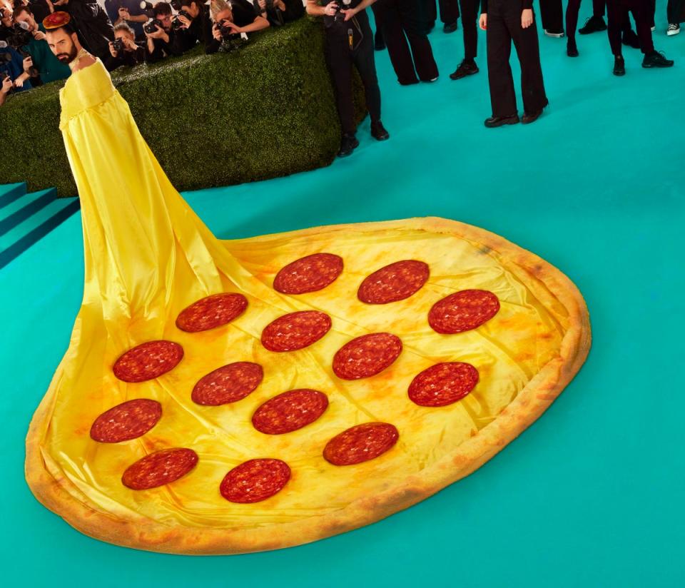 Rylan Clark with a pizza cape in a nod to Rihanna's 2015 Met Gala dress (Deliveroo Restaurant Awards 2024)