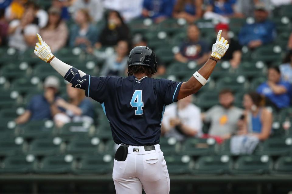 Hooks left fielder Zach Daniels celebrates a home run at home plate during the exhibition game against Texas A&M-Kingsville at Whataburger Field on April 4, 2023, in Corpus Christi, Texas.