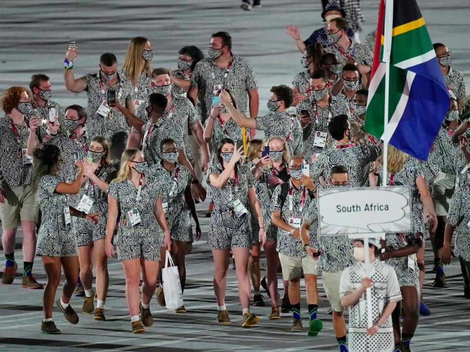 Athletes from South Africa make their entrance at the Summer Olympics.