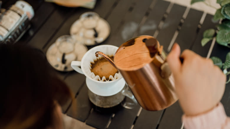 Person making coffee