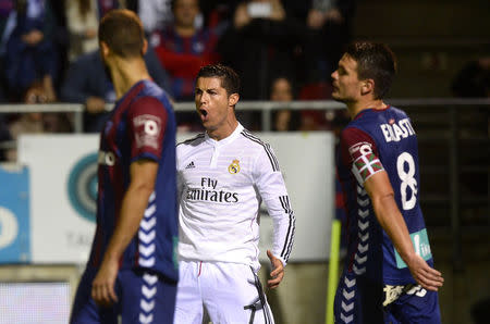 Real Madrid's Cristiano Ronaldo celebrates a goal during their Spanish first division soccer match against Eibar at Ipurua stadium in Eibar November 22, 2014. REUTERS/Vincent West