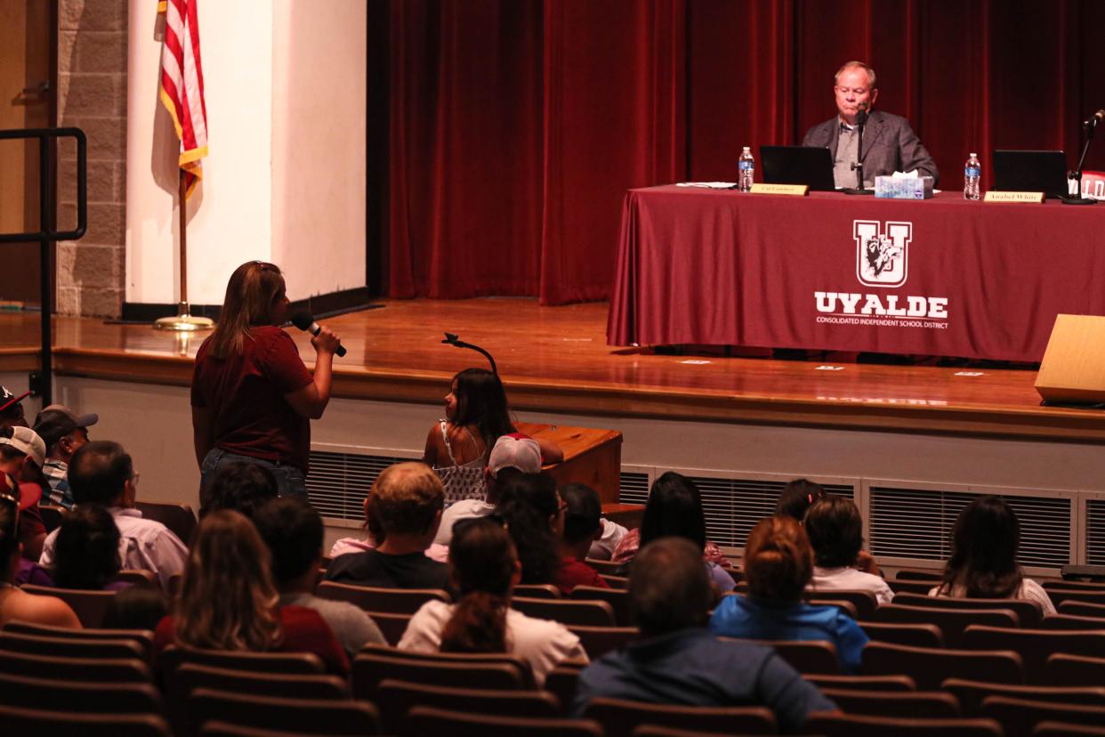 Tina Quintanilla-Taylor, a parent of a Robb Elementary student, speaks during anUvalde Consolidated Independent School District meeting at Uvalde High School on July 18.