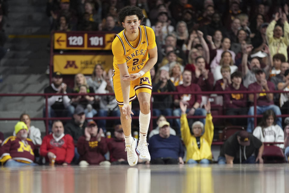 Minnesota guard Mike Mitchell Jr. (2) celebrates after making a basket during the second half of an NCAA college basketball game against Northwestern, Saturday, Feb. 3, 2024, in Minneapolis. (AP Photo/Abbie Parr)