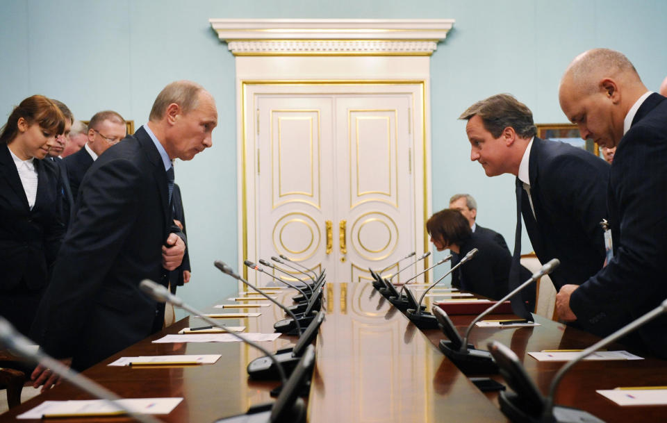 Prime Minister David Cameron meets with Prime Minister of Russia Vladimir Putin (front left) at The White House in Moscow, Russia.