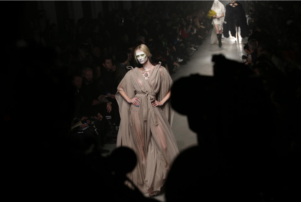 A model wears a creation by designer Vivienne Westwood for her Fall/Winter 2013-2014 ready to wear collection, in Paris, Saturday, March 2, 2013. (AP Photo/Christophe Ena)