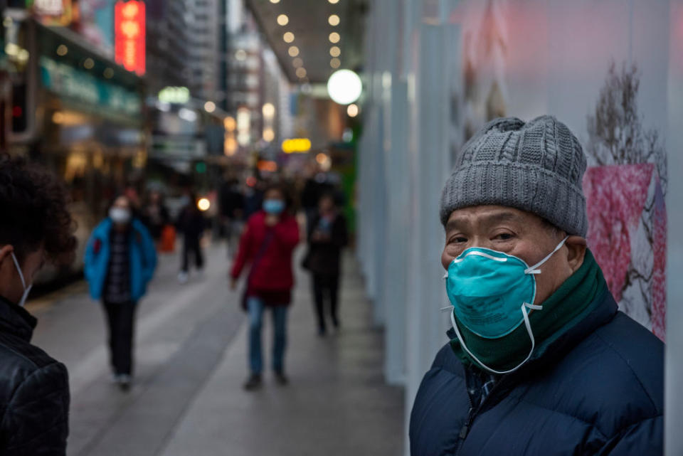 HONG KONG, CHINA - 2020/01/28: A man with a face mask to prevent infections in Hong Kong. Since the spread of the corona virus, the death stands at 106, with the number of infections almost doubling in a day to more than 4,500. (Photo by Miguel Candela/SOPA Images/LightRocket via Getty Images)