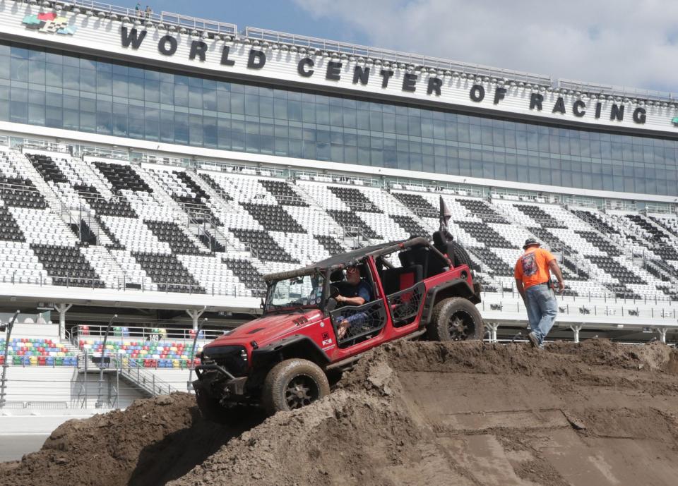 Drivers take on an expanded obstacle course at the Jeep Beach "Main Event" on Friday at Daytona International Speedway. The two-day Speedway event also featured an expanded space for 200+ vendors of Jeep-related products and services.