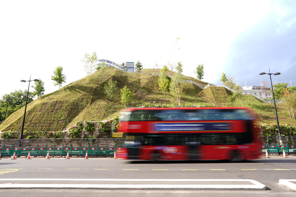 The Marble Arch Mound in central London which has opened to the public. The summit of the new 25-metre high installation will provide sweeping views of Hyde Park, Mayfair and Marylebone when it opens to the public in July. The artificial hill has been built on a scaffolding base, with layers of soil and plywood forming the mound which has a hollow centre with space for exhibitions and displays. Picture date: Tuesday July 27, 2021.