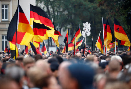 People take part in demonstrations following the killing of a German man in Chemnitz, in Chemnitz, Germany September 1, 2018. REUTERS/Hannibal Hanschke