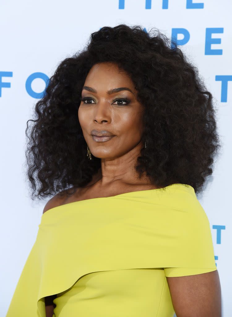 <p>Angela Bassett's haircut falls just at her shoulders, framing her face, and a side part gives the voluminous style some shape. The key to Angela's healthy curls? "Moisturize, moisturize, moisturize!" says Cosseron. </p>