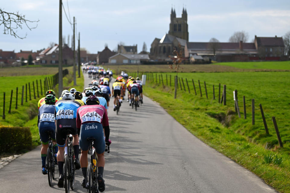 BREDENE BELGIUM  MARCH 17 A general view of Declan Irvine of Australia and Team Novo Nordisk Daan Van Sintmaartensdijk of The Netherlands and VolkerWessels Cycling Team Nicolas Dalla Valle of Italy and Team Corratec and the peloton compete during the 21th Bredene Koksijde Classic 2023 a 1916km one day race from Bredene to Koksijde on March 17 2023 in Koksijde Belgium Photo by Luc ClaessenGetty Images