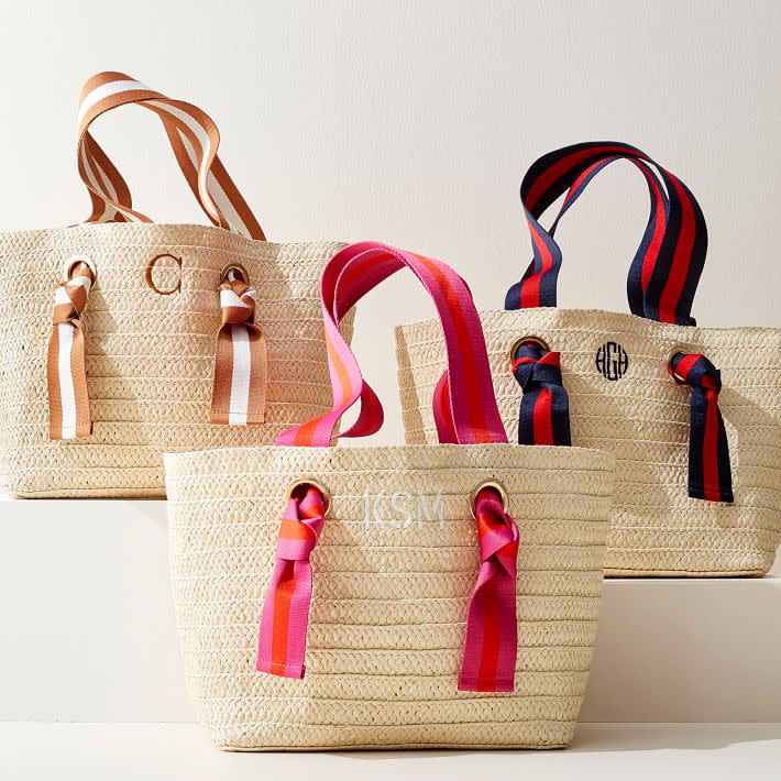 <p><a href="https://go.redirectingat.com?id=74968X1596630&url=https%3A%2F%2Fwww.markandgraham.com%2Fproducts%2Fstraw-tote-with-knotted-handles%2F&sref=https%3A%2F%2Fwww.townandcountrymag.com%2Fstyle%2Ffashion-trends%2Fg39800012%2Fbest-beach-bags%2F" rel="nofollow noopener" target="_blank" data-ylk="slk:Shop Now;elm:context_link;itc:0;sec:content-canvas" class="link ">Shop Now</a></p><p>Ribbon Straw Beach Tote</p><p>$59.99</p><p>markandgraham.com</p><span class="copyright">Product Shot Image</span>