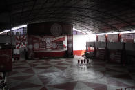 A "quadra" or court, which this time of year is usually filled with Carnival performers practicing their dance moves, sits empty in the Unidos de Padre Miguel samba school, in Rio de Janeiro, Brazil, Monday, Sept. 21, 2020. Rio de Janeiro on Thursday, Sept. 24, said it has delayed its annual Carnival parade, saying the global spectacle cannot go ahead in February because of Brazil’s continued vulnerability to the new coronavirus pandemic. (AP Photo/Silvia Izquierdo)