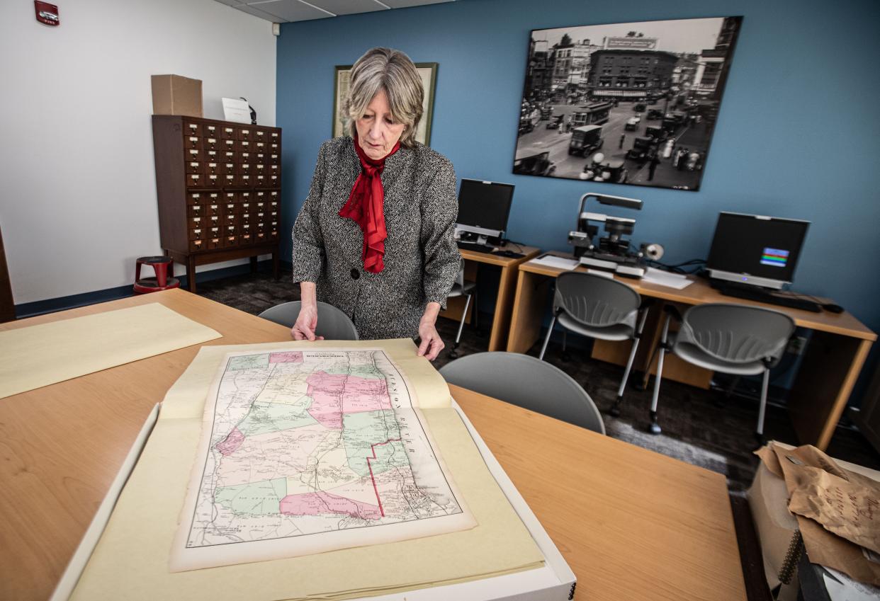 Barbara Davis, the Westchester County historian, looks at historical map at the Westchester County Records Center Nov. 14, 2023. Davis explains how county residents can learn about the history of their homes by both searching online and with resources available at the county historical society.