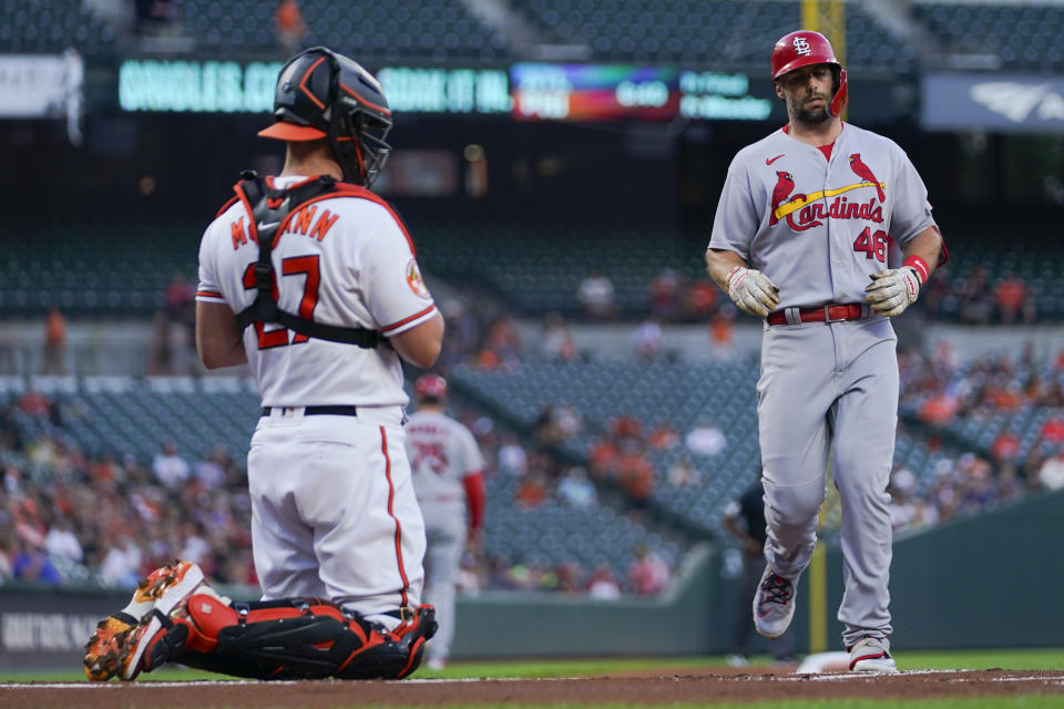 St. Louis Cardinals' Paul Goldschmidt runs the bases after hitting a solo home run off Baltimore Orioles starting pitcher John Means in the first inning of a baseball game, Tuesday, Sept. 12, 2023 in Baltimore. Orioles catcher James McCann, left, looks on. (AP Photo/Julio Cortez)