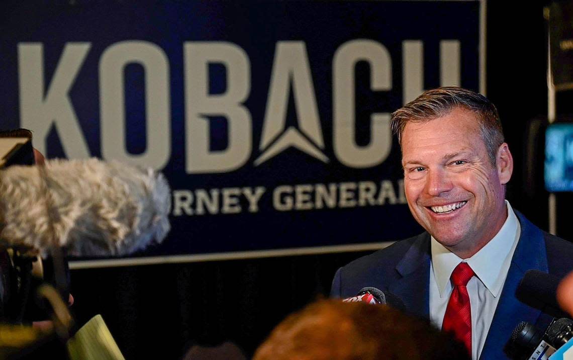 Kris Kobach, the Republican nominee for Kansas attorney general, talks to the media before a GOP watch party on Tuesday, Nov. 8, 2022, in Topeka, Kansas.