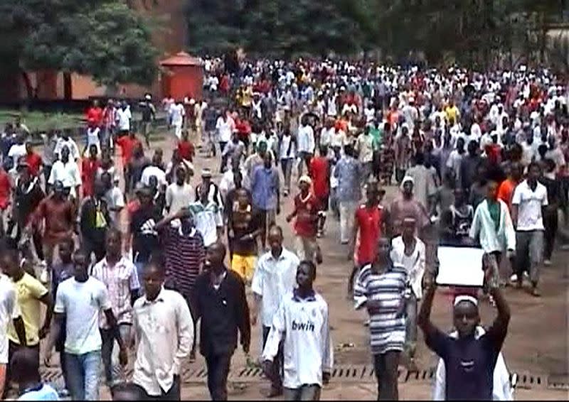 FILE PHOTO: Frame grab of people entering the stadium in Conakry