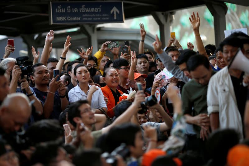 Supporters wave their hands at sudden unauthorised rally by the progressive Future Forward Party in Bangkok