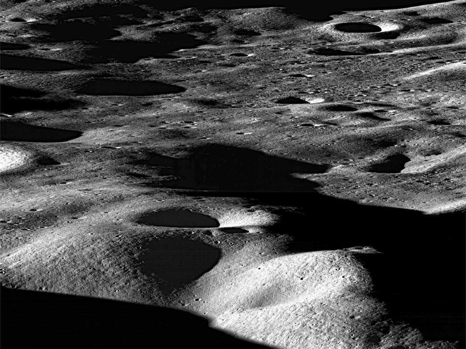 moon surface mountains shadow
