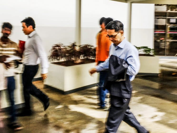 Vincent Tan, Senior Vice President of Rail Operations/International Engagements with SMRT Trains, leaving the State Courts after the case concluded on Tuesday (28 February). (PHOTO: Yahoo Newsroom / Nigel Chin)