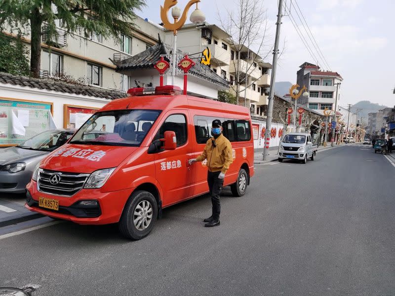 A handout photo shows a businessman Luca Zhou, 56, wearing a face mask on the streets of Prato