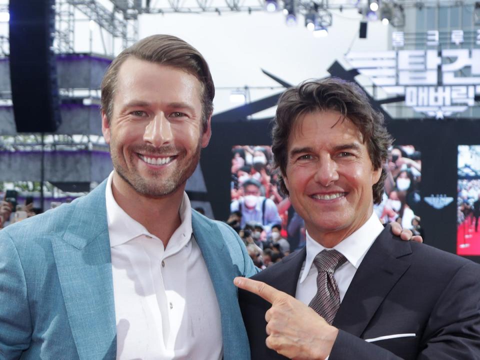 Powell and Cruise at the Korean premiere of ‘Top Gun: Maverick’ (Getty Images)