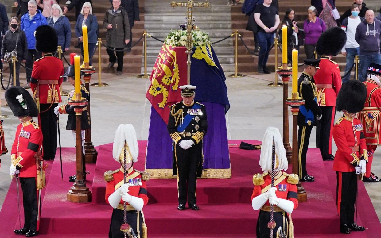 King Charles III, the Princess Royal, the Duke of York and the Earl of Wessex hold a vigil beside the coffin of their mother in Westminster Hall on Friday - Yui Mok/Reuters