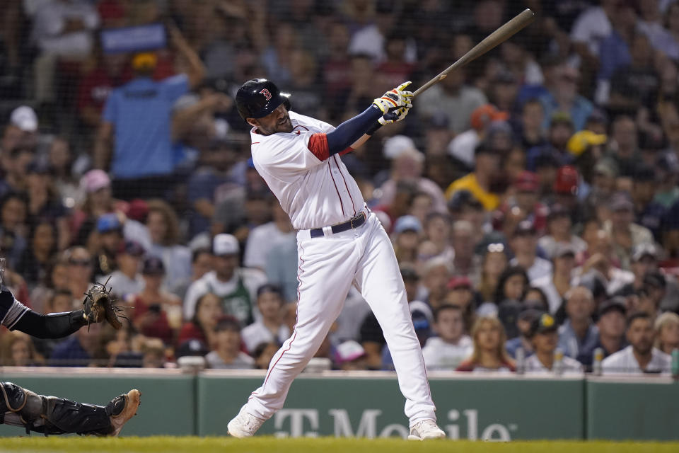 Boston Red Sox's J.D. Martinez (28) hits a two-run home run in the fifth inning of a baseball game against the New York Yankees, Sunday, July 10, 2022, in Boston. (AP Photo/Steven Senne)