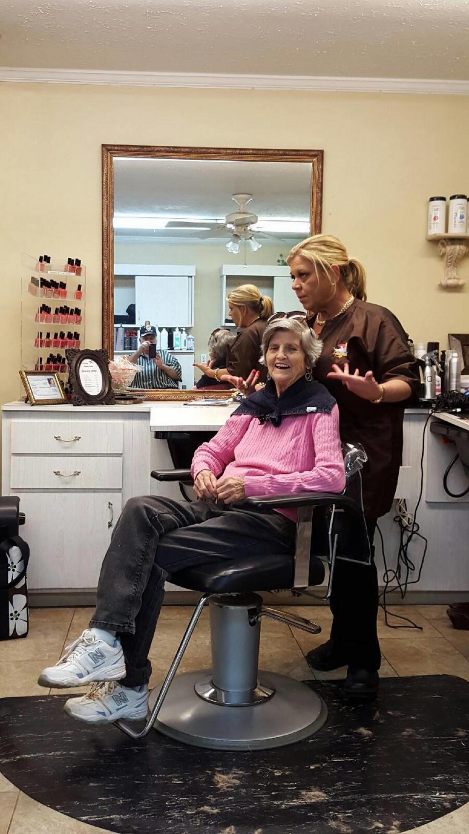 Peggy Beaulieu gets her hair cut by Gina Shelley, co-owner of Tangulls hair salon. Peggy was the oldest resident of Patrick’s Mobile Home Park and passed away in 2017. Courtesy/Courtesy