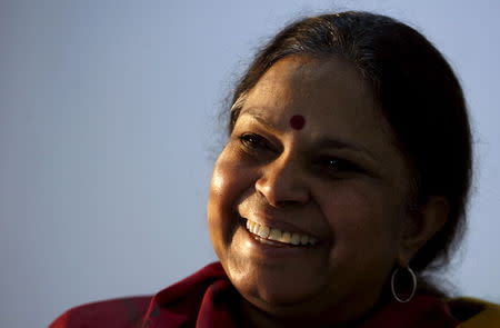 Sujatha Rao smiles during an interview with Reuters in New Delhi in this January 31, 2007 file photo. REUTERS/Adnan Abidi/Files