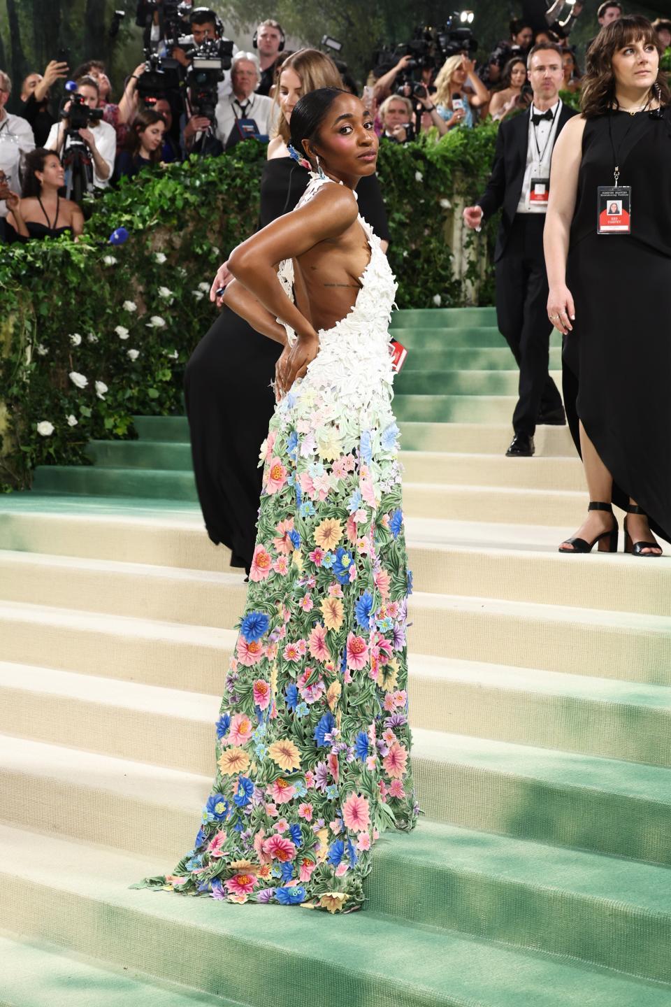 Ayo Edebiri in a floral gown with pops of green at the 2024 Met Gala (Getty Images)