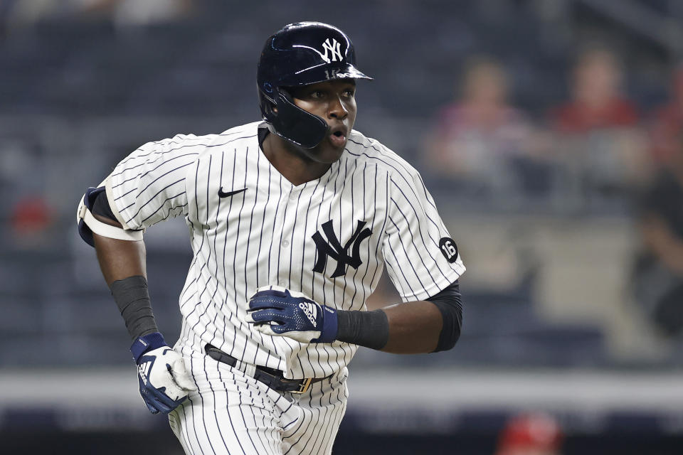 New York Yankees' Estevan Florial watches his solo home run during the eighth inning of the team's baseball game against the Philadelphia Phillies on Tuesday, July 20, 2021, in New York. (AP Photo/Adam Hunger)