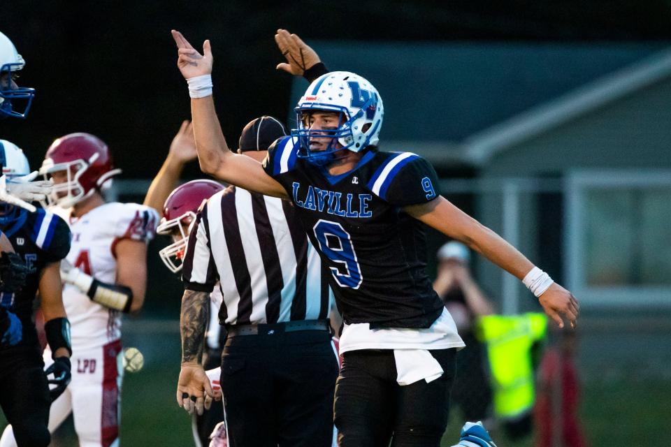 Laville's Lucas Plummer (9) celebrates a turnover during the LaVille vs. Knox High School football game Friday, Sept. 22, 2023 at LaVille High School in Lakeville.