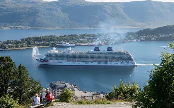 P&O Cruises MV Britannia departing port on August 9, 2017 in Alesund, Norway - 2017 James Morgan