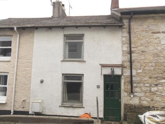 <p>Looking for an investment project? This white-stone Cornish home might be situated in the charming seaside town of Penryn, but it's in desperate need of some TLC. </p><p><a href="https://www.zoopla.co.uk/for-sale/details/57791595/" rel="nofollow noopener" target="_blank" data-ylk="slk:This property is currently on the market for £157,500 with Miller Countrywide via Zoopla.;elm:context_link;itc:0;sec:content-canvas" class="link ">This property is currently on the market for £157,500 with Miller Countrywide via Zoopla.</a><br></p>