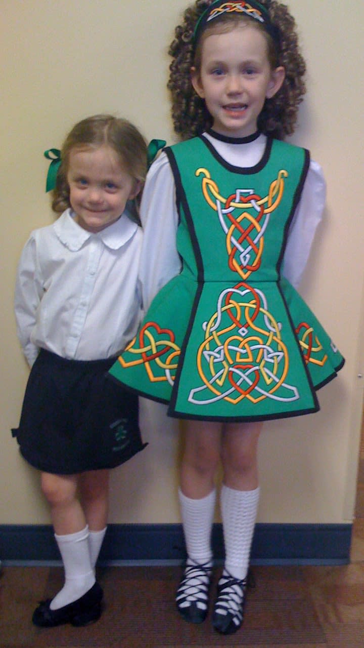 two little girls in Irish dancing outfits