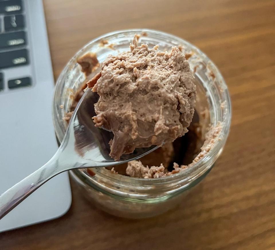 A spoonful of cottage cheese chocolate mousse.