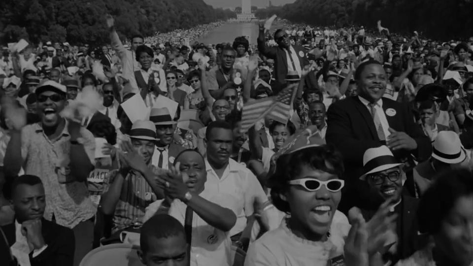 A crowd listens to Martin Luther King Jr. speak at the March on Washington in "MLK/FBI."