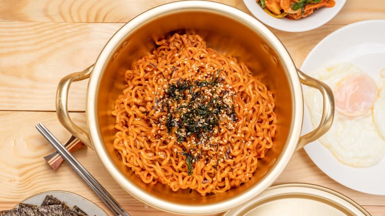 Top-down view of kimchi fry topped with seaweed