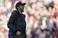 Liverpool's manager Jurgen Klopp celebrates after the English Premier League soccer match between Liverpool and Everton at Anfield stadium in Liverpool, England, Sunday, April 24, 2022. (AP Photo/Jon Super)