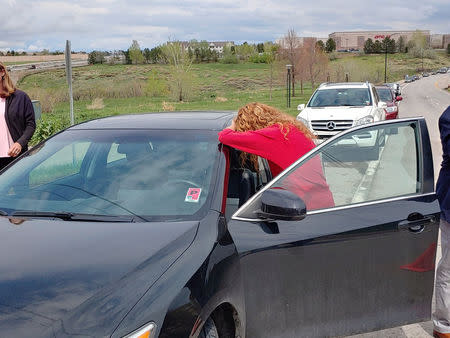 A parent reacts near the STEM School during a shooting incident in Highlands Ranch, Colorado, U.S. in this May 7, 2019 image obtained via social media. STEFFAN TUBBS/VIA REUTERS