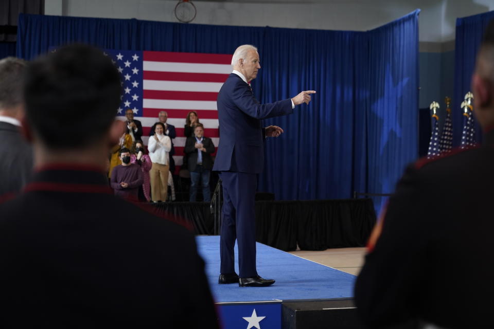 President Joe Biden gestures to someone in the audience after speaking about expanding access to health care and benefits for veterans affected by military environmental exposures at the Resource Connection of Tarrant County in Fort Worth, Texas, Tuesday, March 8, 2022. (AP Photo/Patrick Semansky)