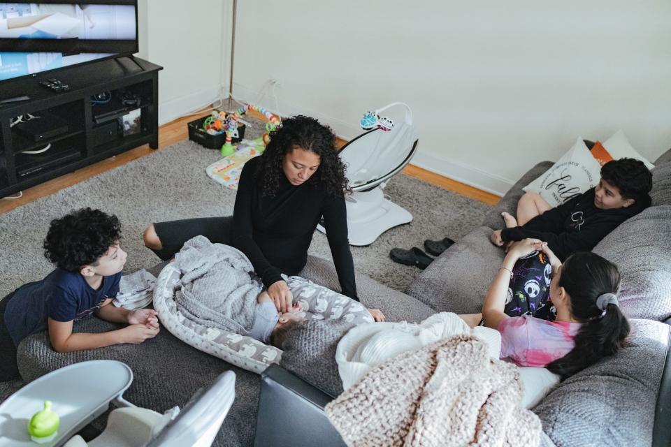 Viviana Echavarria, 38, speaks with her kids about their upcoming return to in-person classes on Nov. 17. Viviana and her husband were among the parents of New York City school students who didn't feel it was safe for their children to return to in-person learning during the ongoing public health crisis. Viviana says they plan to send her children back to school now that her son Achilles, 11, has received his first COVID-19 shot.