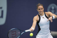 Maria Sakkari, of Greece, returns a ball from Yue Yuan, of China, in their women's second round match at the Miami Open tennis tournament, Thursday, March 21, 2024, in Miami Gardens, Fla. (AP Photo/Rebecca Blackwell)