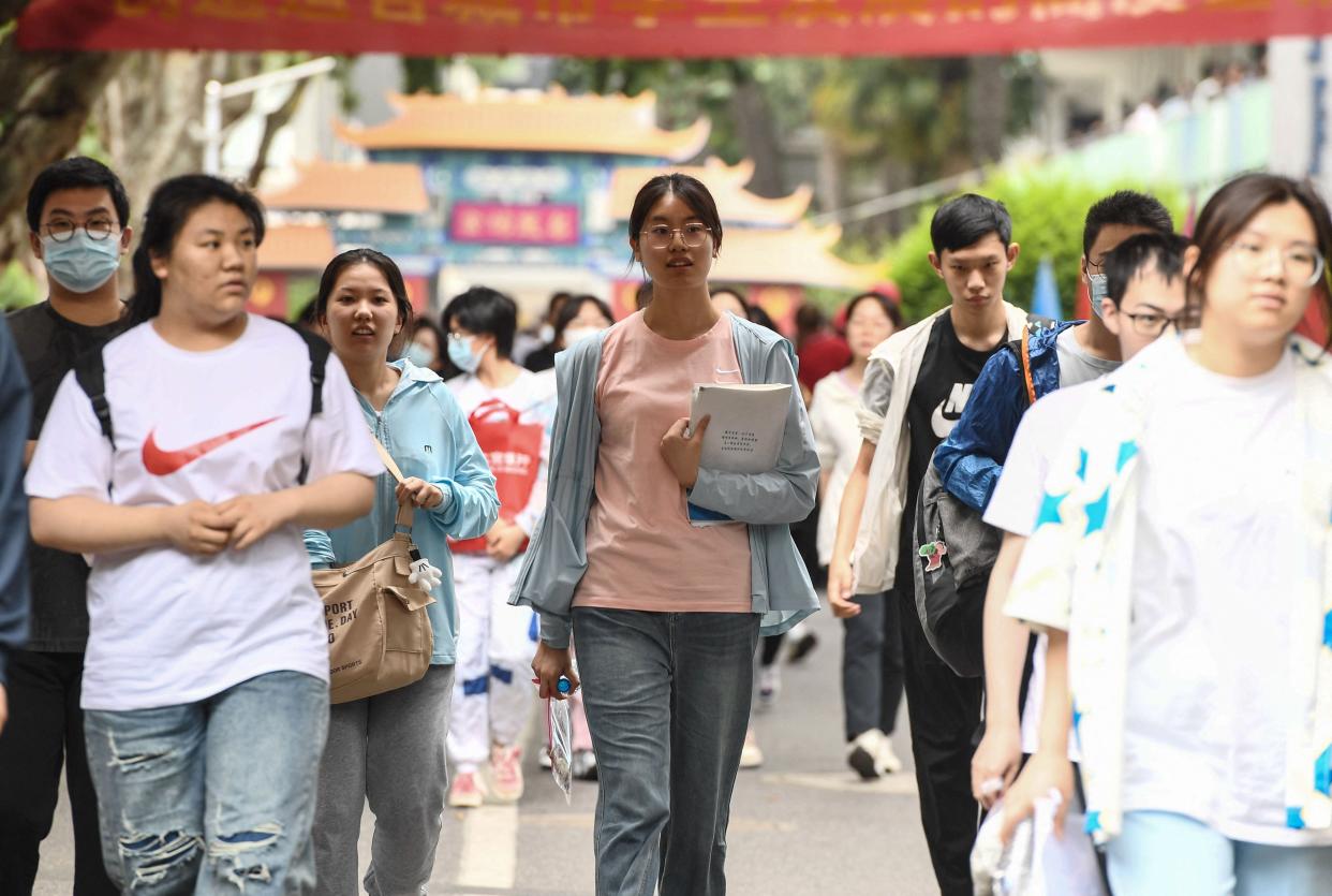 Students leave after their first exam during the first day of the National College Entrance Examination (NCEE), known as "gaokao", in Nanjing, in China's eastern Jiangsu province on June 7, 2023.