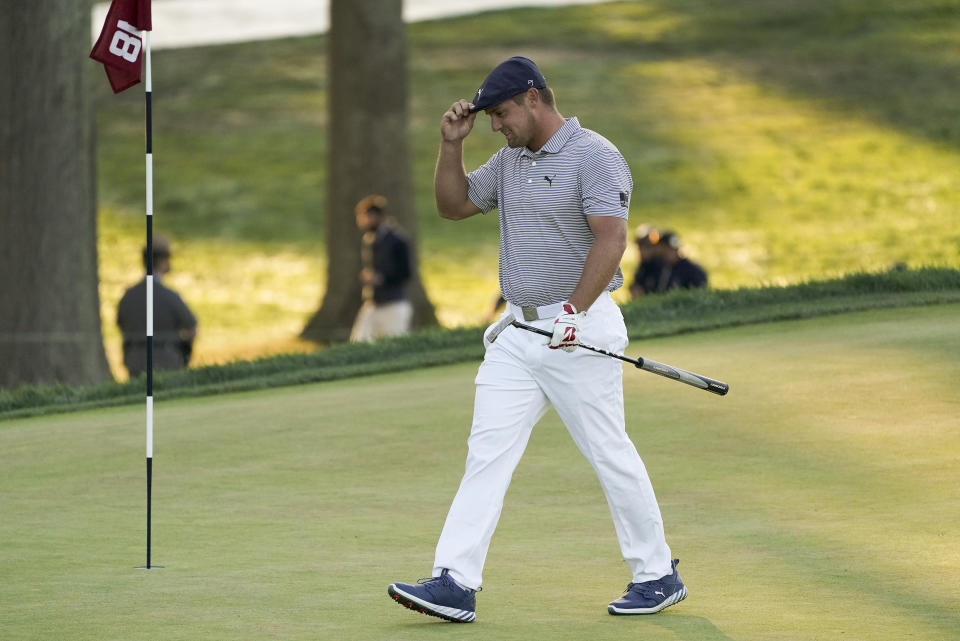 Bryson DeChambeau, of the United States, walks up to the 18th green during the final round of the US Open Golf Championship, Sunday, Sept. 20, 2020, in Mamaroneck, N.Y. (AP Photo/John Minchillo)